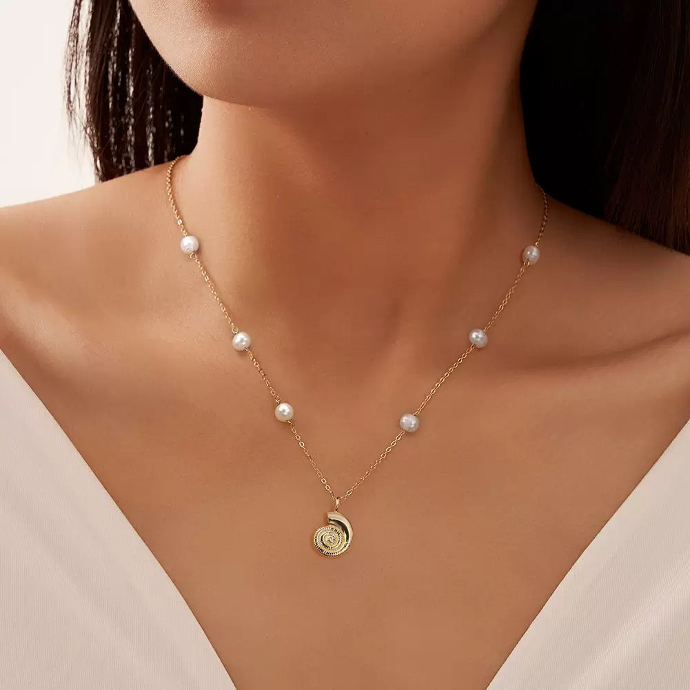 Ocean Coil – Pearl & Nautilus Pendant Necklace