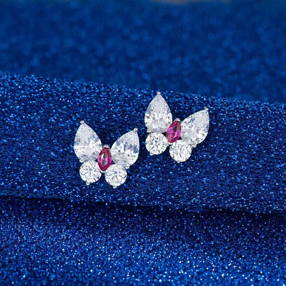 Butterfly Radiance – Sterling Silver & Ruby Butterfly Stud Earrings