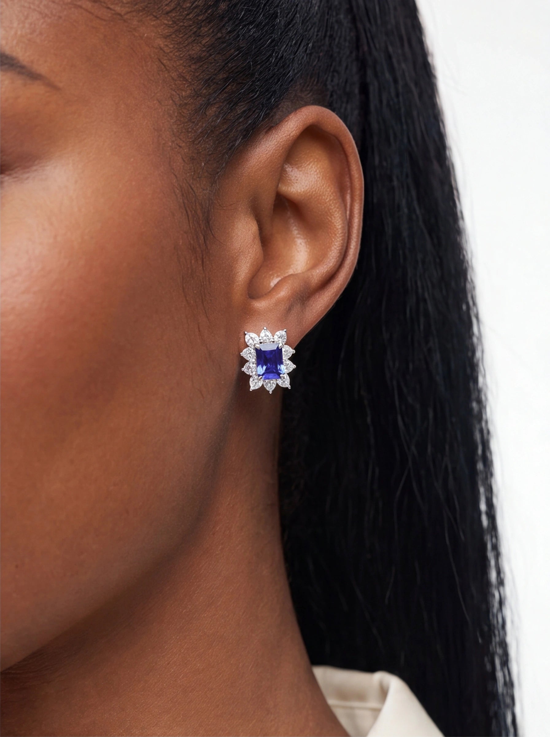 Royal Glow – Sterling Silver & Blue Tanzanite Halo Stud Earrings