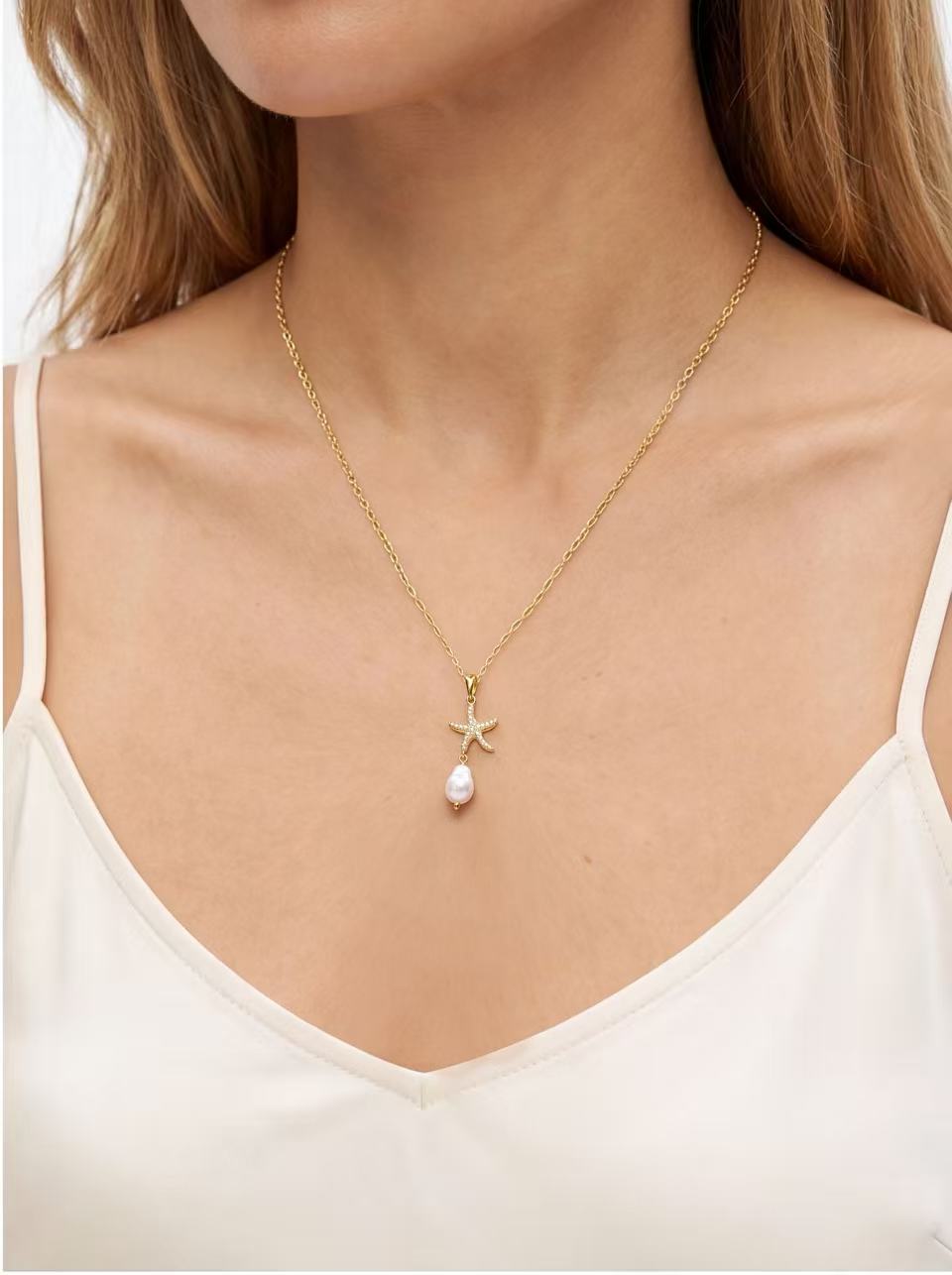 Starfish Baroque Sun Pendant Necklace product photo by Starlight