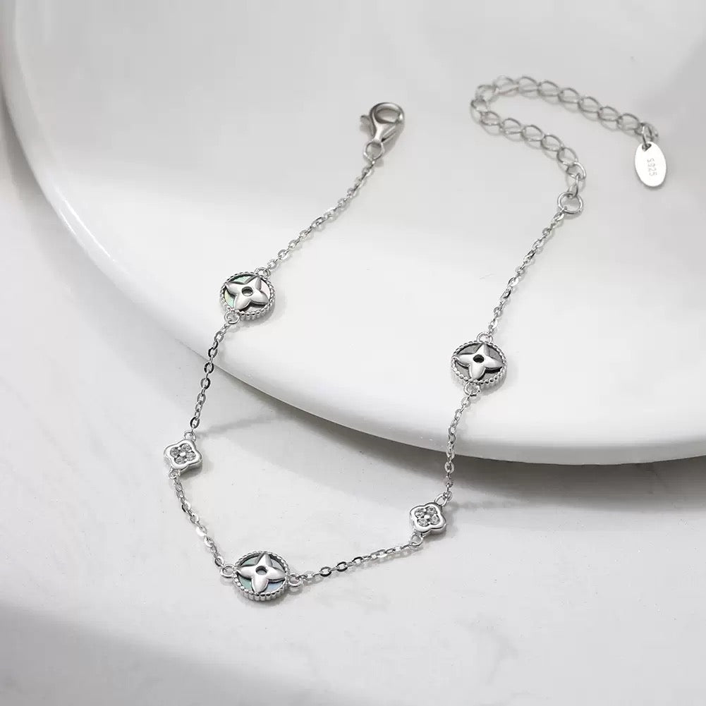 Midnight Bloom Clover Shell Charm Bracelet product photo by Starlight