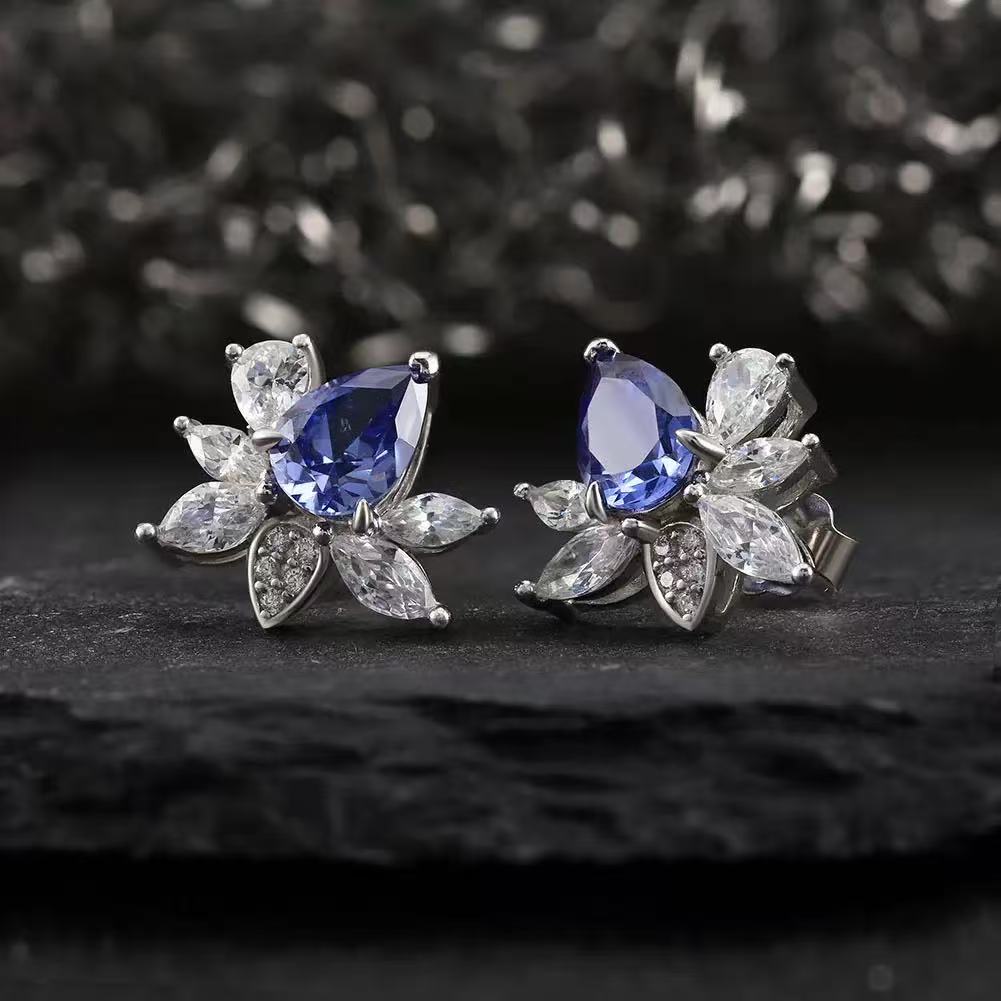 Radiant Blossom – Blue Sapphire & CZ Stud Earrings