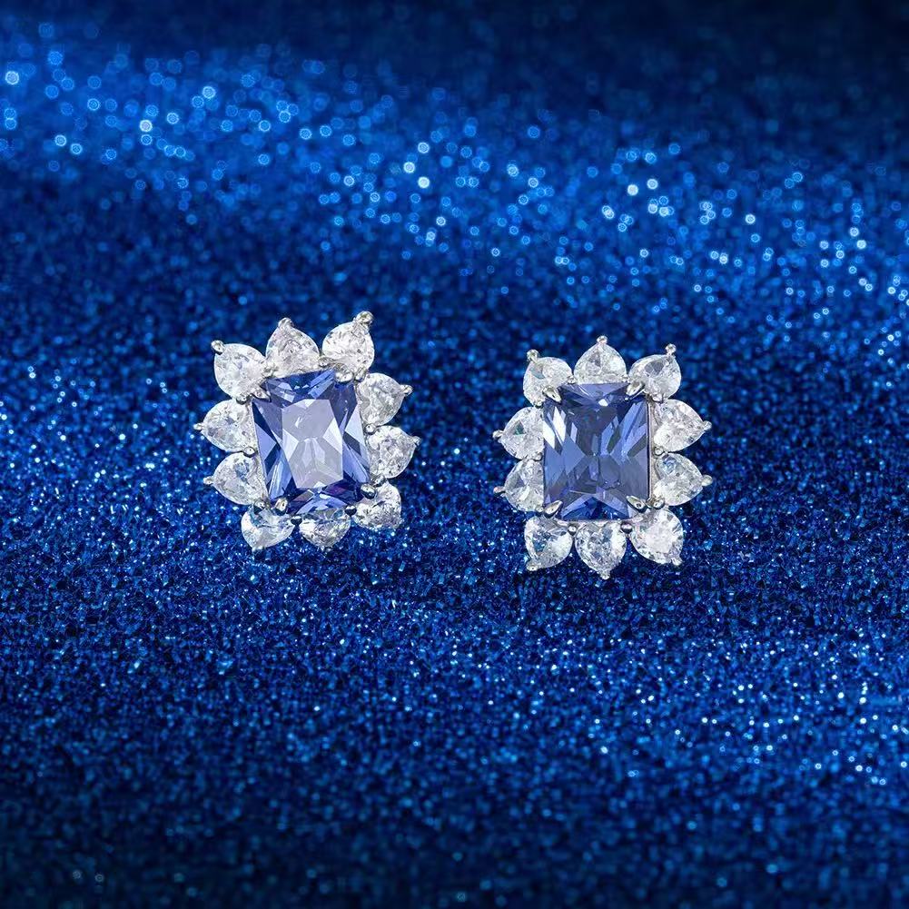 Royal Glow – Sterling Silver & Blue Tanzanite Halo Stud Earrings
