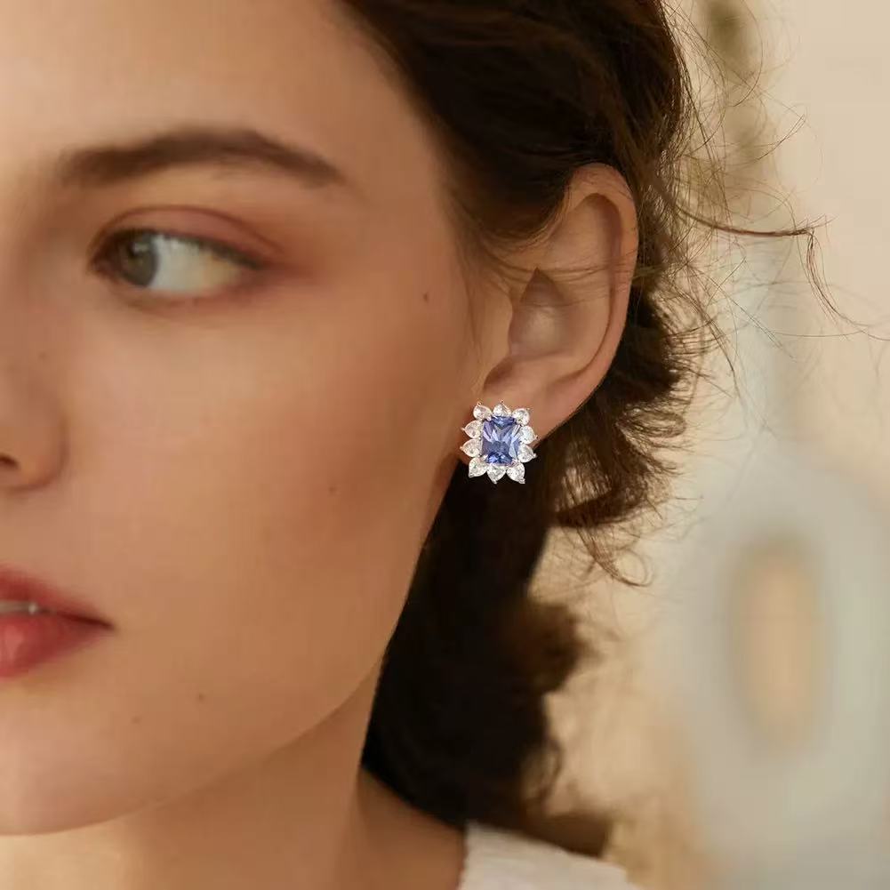 Royal Glow – Sterling Silver & Blue Tanzanite Halo Stud Earrings