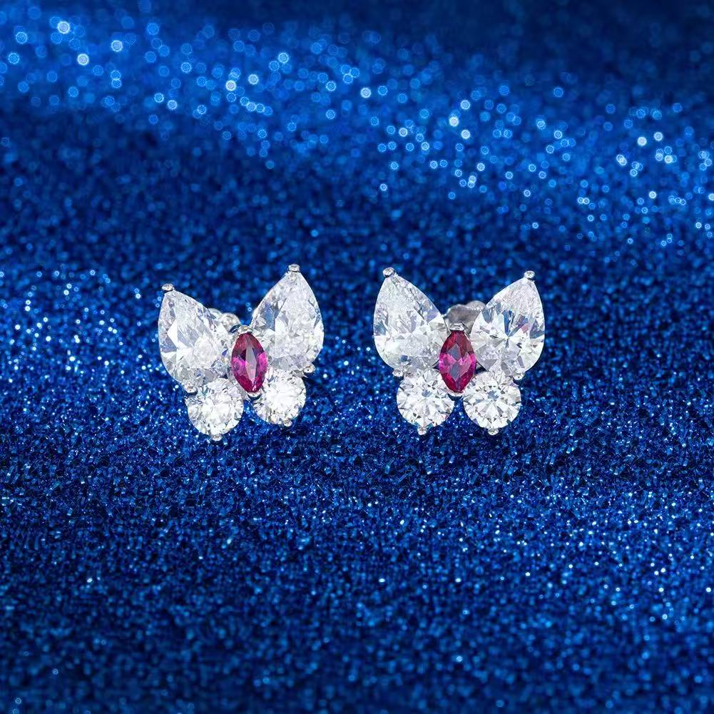 Butterfly Radiance – Sterling Silver & Ruby Butterfly Stud Earrings