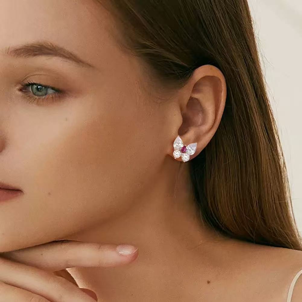Butterfly Radiance – Sterling Silver & Ruby Butterfly Stud Earrings
