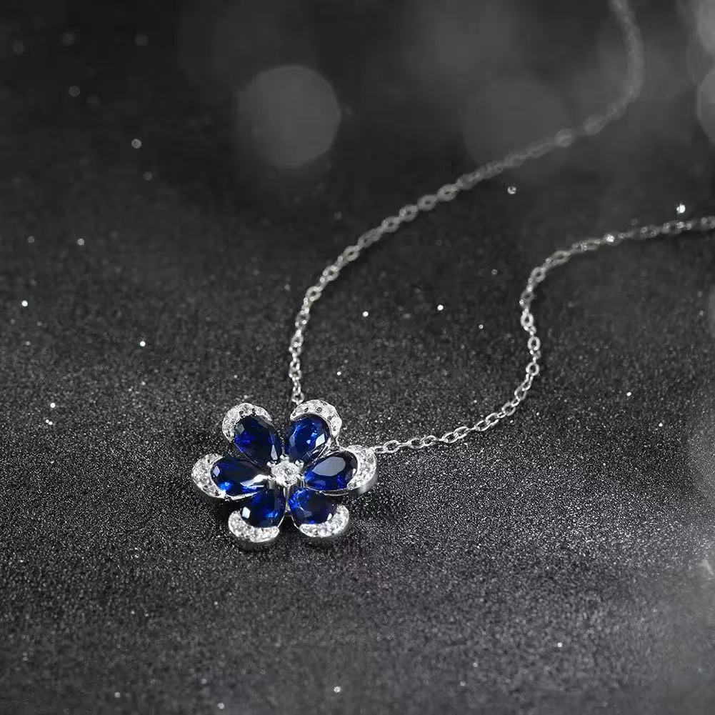 Blossom Radiance – Sterling Silver & Sapphire Flower Pendant Necklace