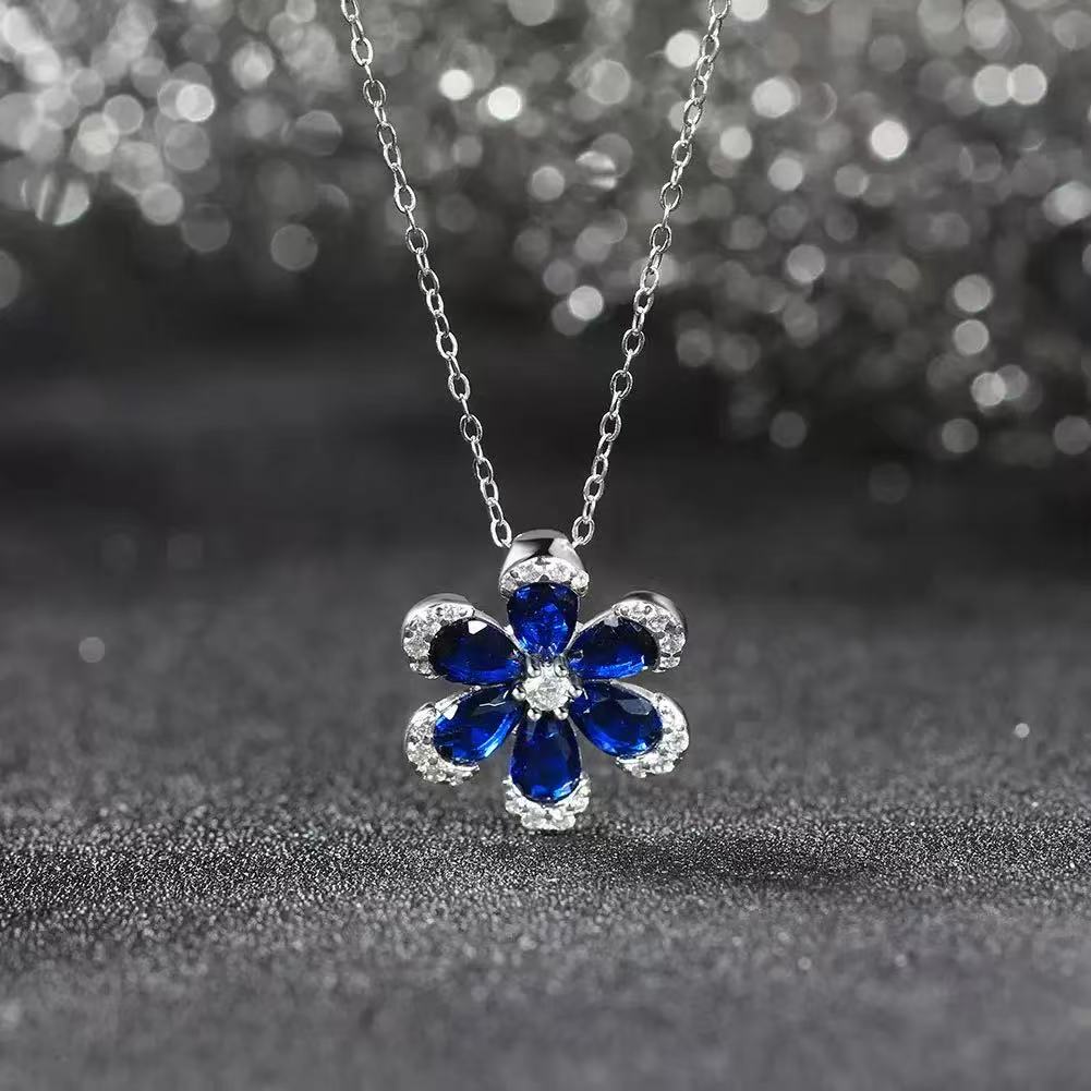 Blossom Radiance – Sterling Silver & Sapphire Flower Pendant Necklace