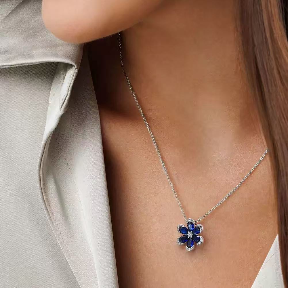 Blossom Radiance – Sterling Silver & Sapphire Flower Pendant Necklace