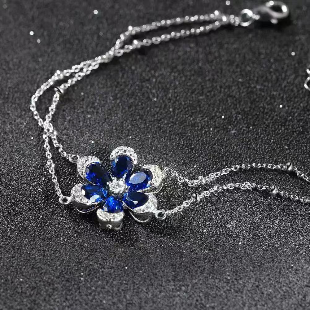 Floral Elegance – Sterling Silver & Sapphire Blossom Chain Bracelet
