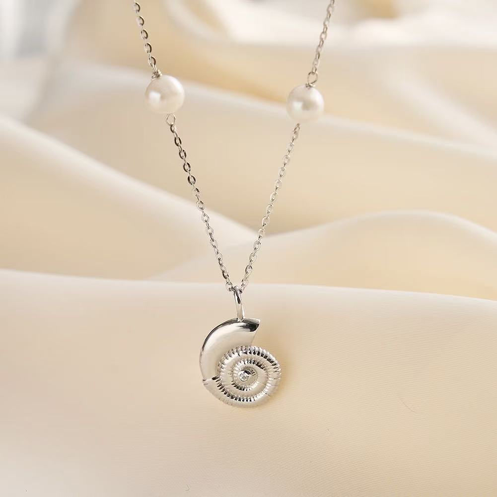 Ocean Coil Shell Sun Layered Necklace product photo by Starlight