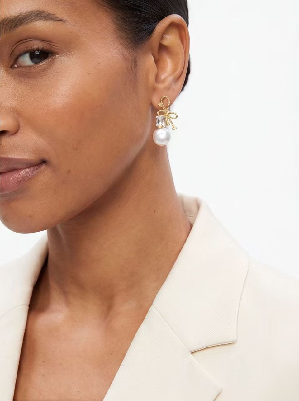 Bow Pearl Line Drop Earrings product photo by Starlight