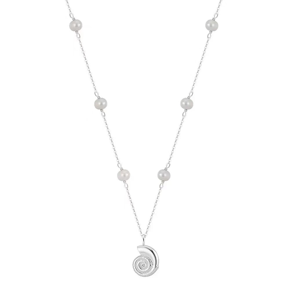 Ocean Coil Shell Sun Layered Necklace product photo by Starlight