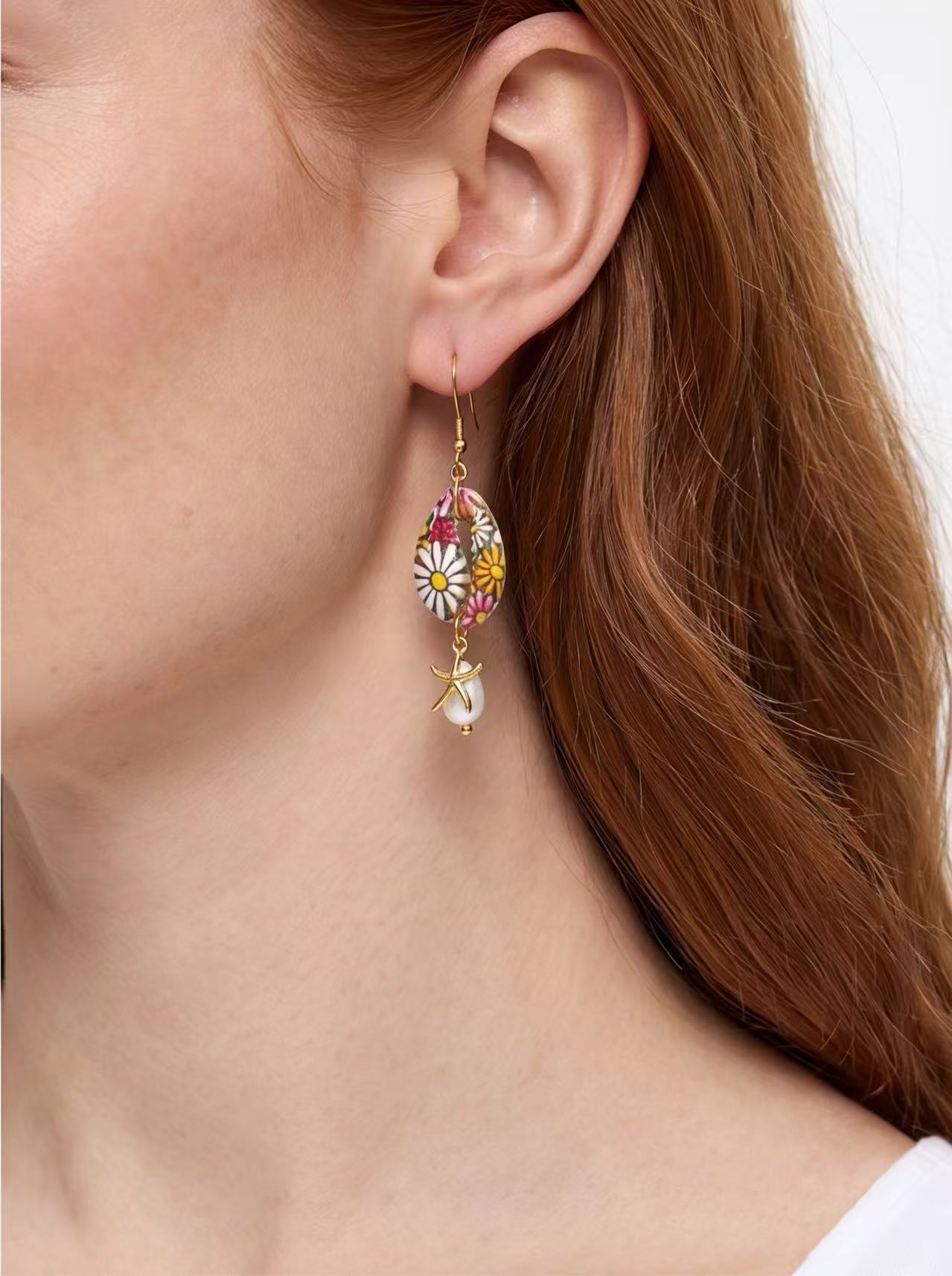 Seashell Pearl Detail Drop Earrings product photo by Starlight