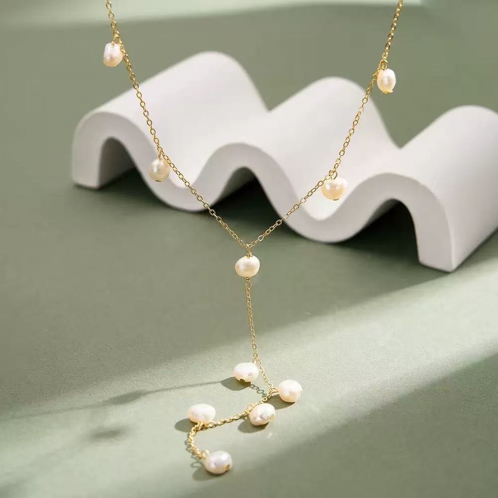 Floating Pearl Lariat Necklace