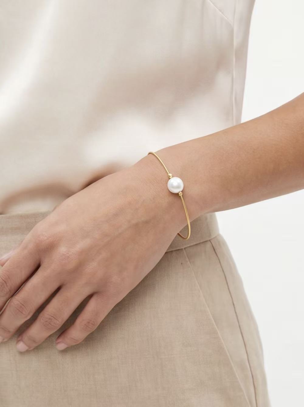 Solara Pearl Sun Charm Bracelet product photo by