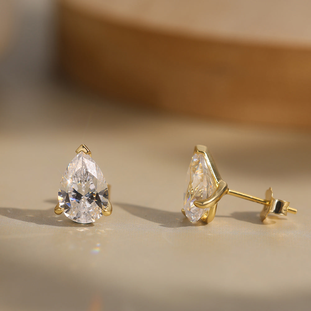 Pear Cut Moissanite Solitaire Stud Earrings — product and styling view