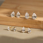 Pear Cut Moissanite Solitaire Stud Earrings — product and styling view