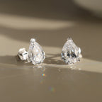 Pear Cut Moissanite Solitaire Stud Earrings — product and styling view