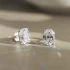 Oval Cut Moissanite Solitaire Stud Earrings — product and styling view