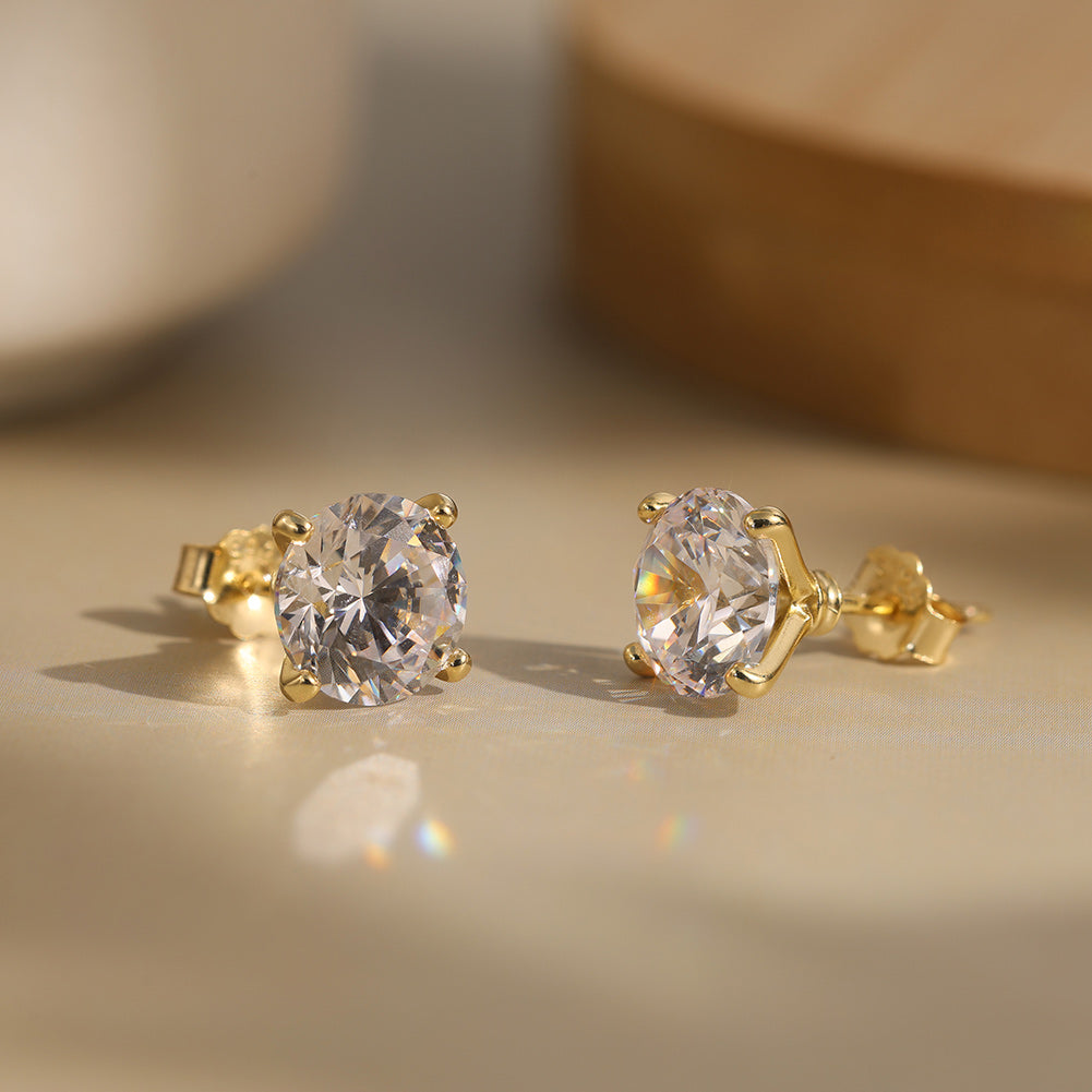 Four Prong Round Moissanite Stud Earrings — product and styling view