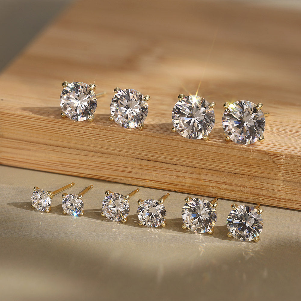 Four Prong Round Moissanite Stud Earrings — product and styling view