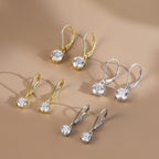 Round Solitaire Moissanite Leverback Earrings — product and styling view