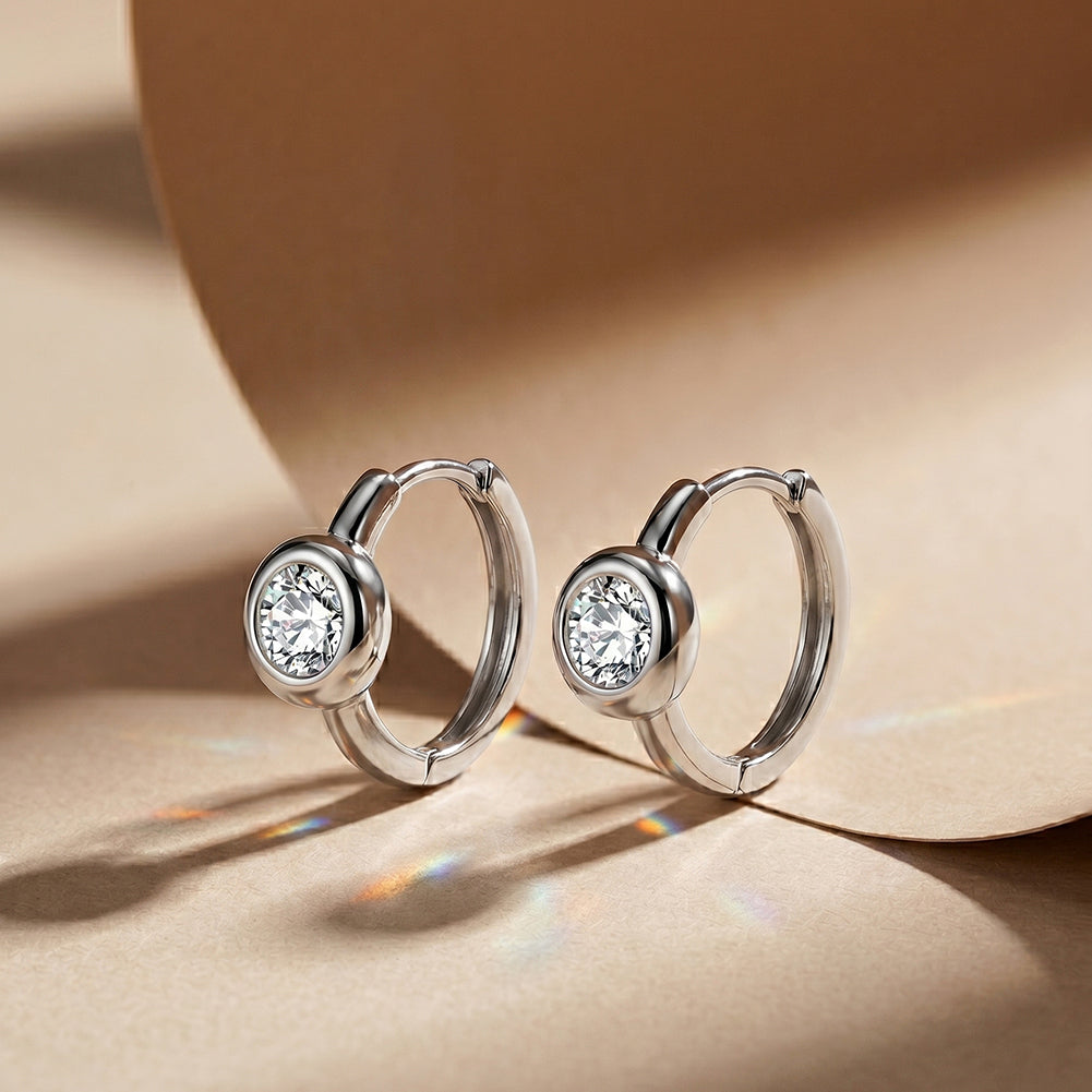 Bezel Solitaire Moissanite Huggie Earrings — product and styling view