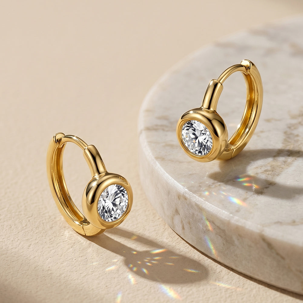 Bezel Solitaire Moissanite Huggie Earrings — product and styling view
