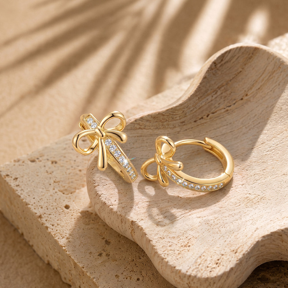 Bow Moissanite Huggie Earrings — product and styling view