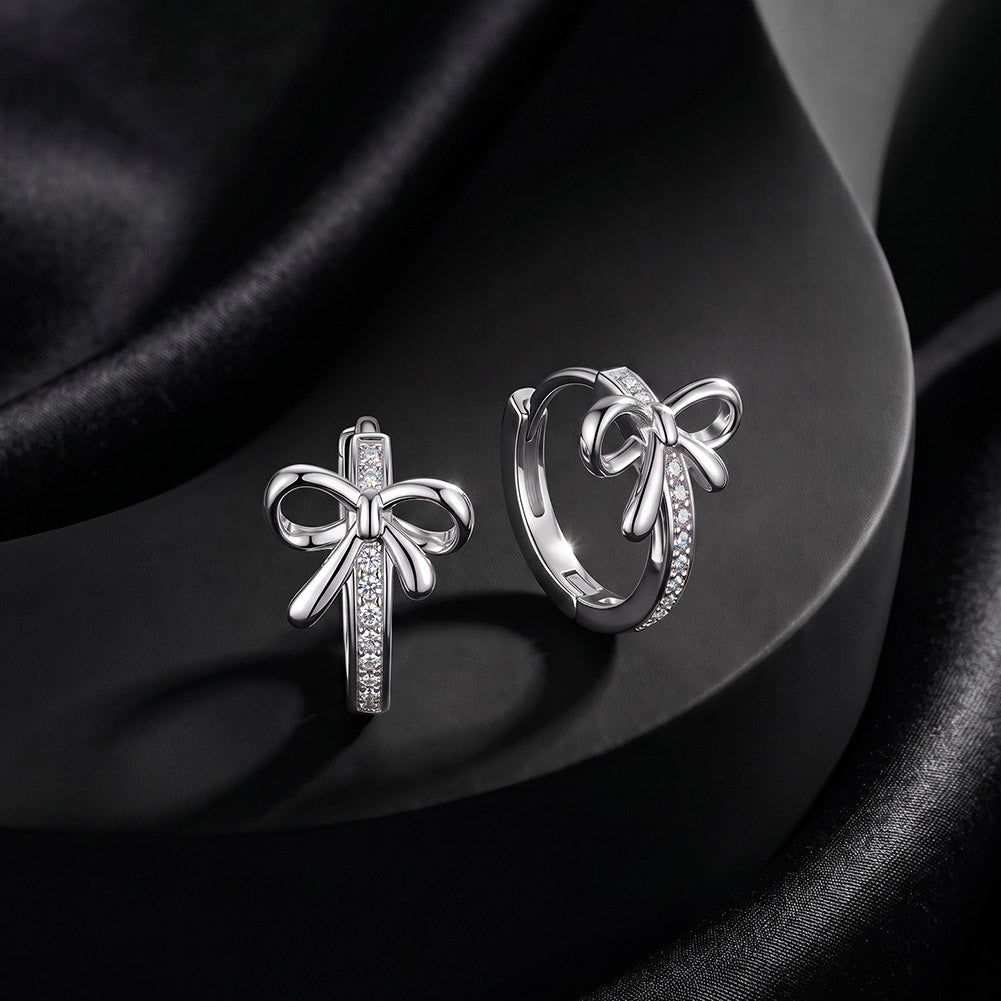 Bow Moissanite Huggie Earrings — product and styling view