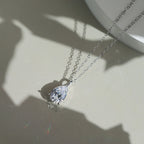 Pear Cut Moissanite Solitaire Pendant Necklace — product and styling view