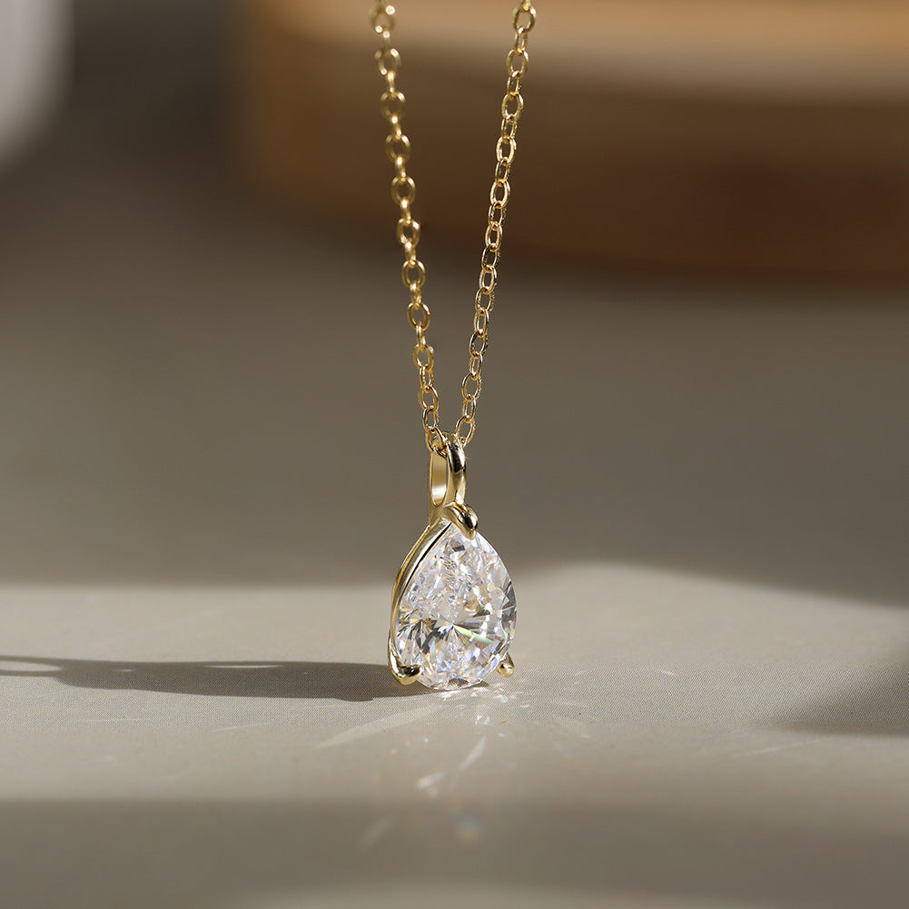 Pear Cut Moissanite Solitaire Pendant Necklace — product and styling view