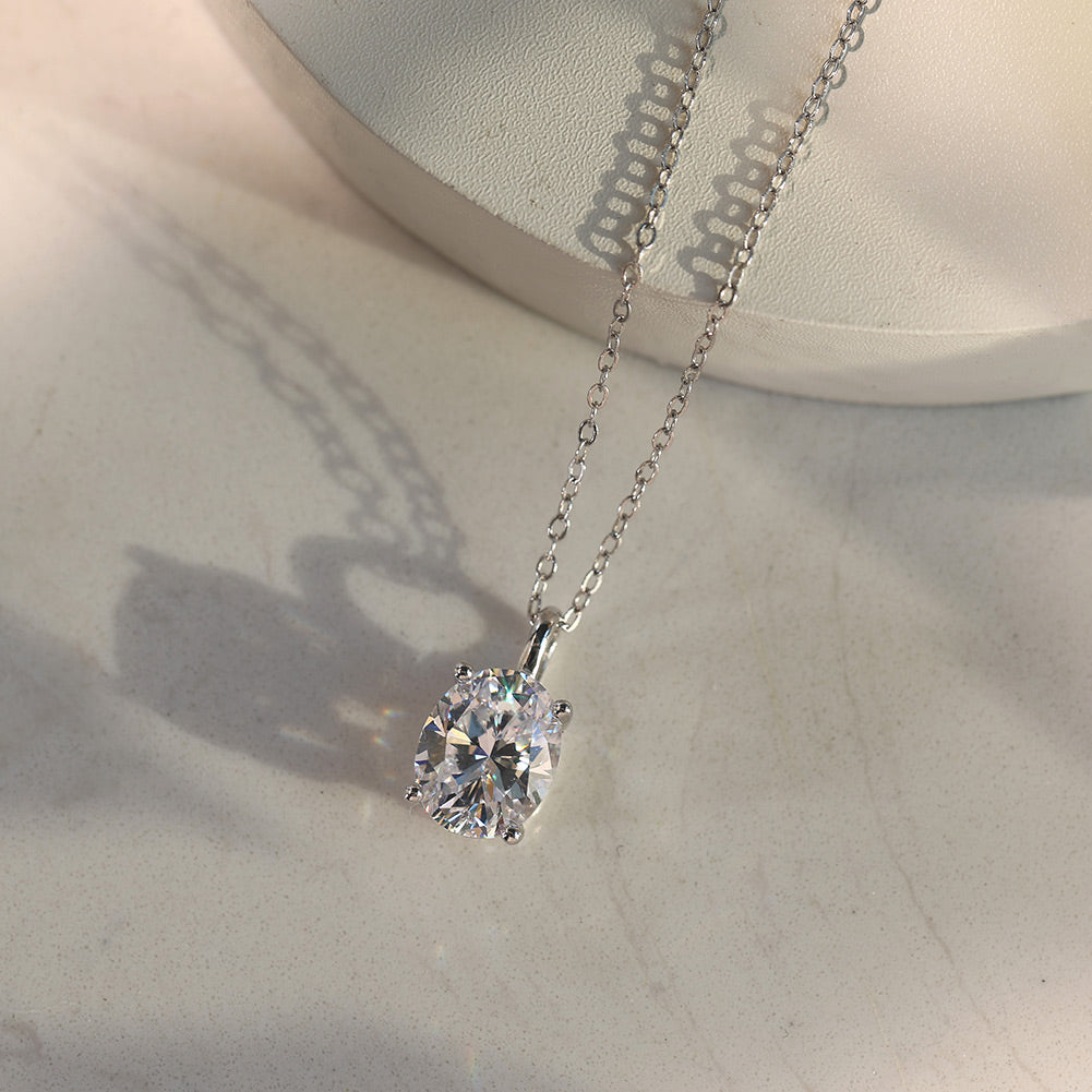 Oval Cut Moissanite Solitaire Pendant Necklace — product and styling view