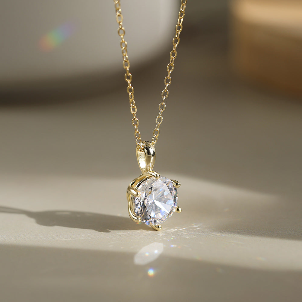 Six Prong Round Moissanite Solitaire Necklace — product and styling view