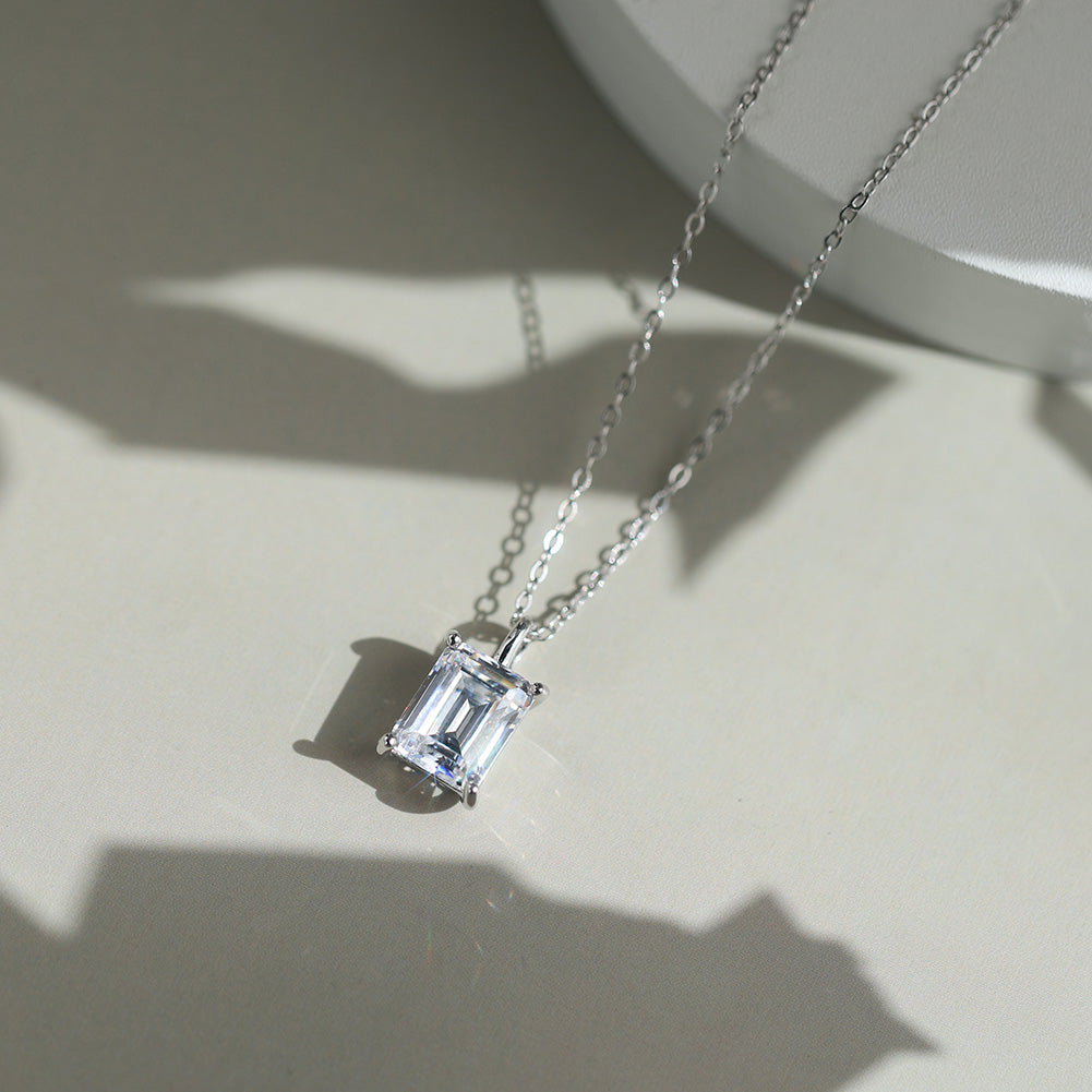 Emerald Cut Moissanite Solitaire Necklace — product and styling view