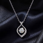 Twist Teardrop Moissanite Pendant Necklace — product and styling view