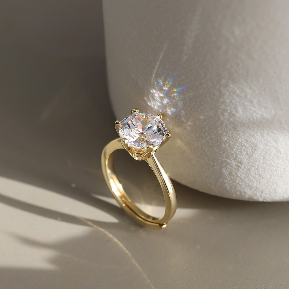 Six Prong Round Moissanite Adjustable Ring — product and styling view