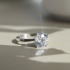 Four Prong Round Moissanite Adjustable Ring — product and styling view