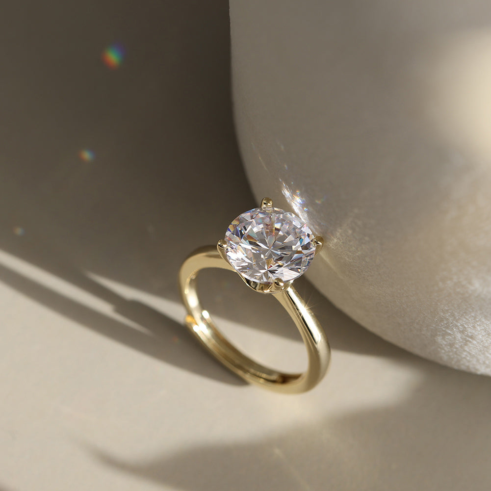 Four Prong Round Moissanite Adjustable Ring — product and styling view