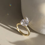 Four Prong Round Moissanite Adjustable Ring — product and styling view
